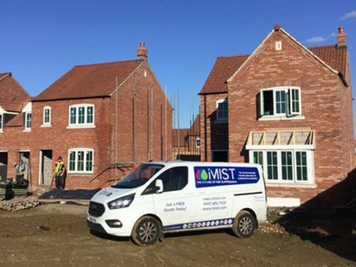 water mist fire suppression installation team on site